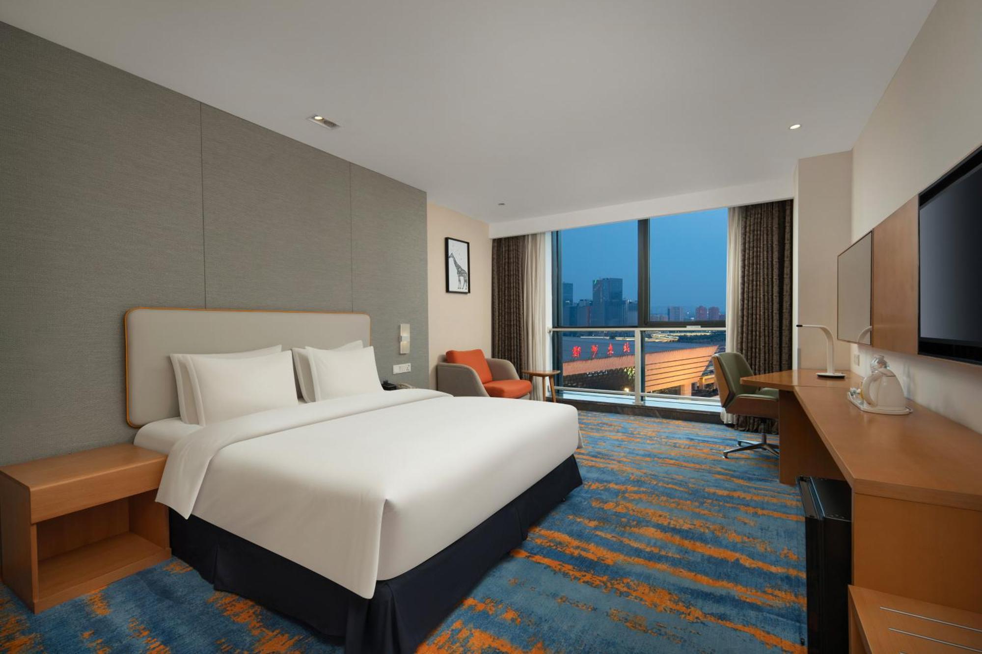Holiday Inn Express Zhengzhou Zhengdong By Ihg Экстерьер фото