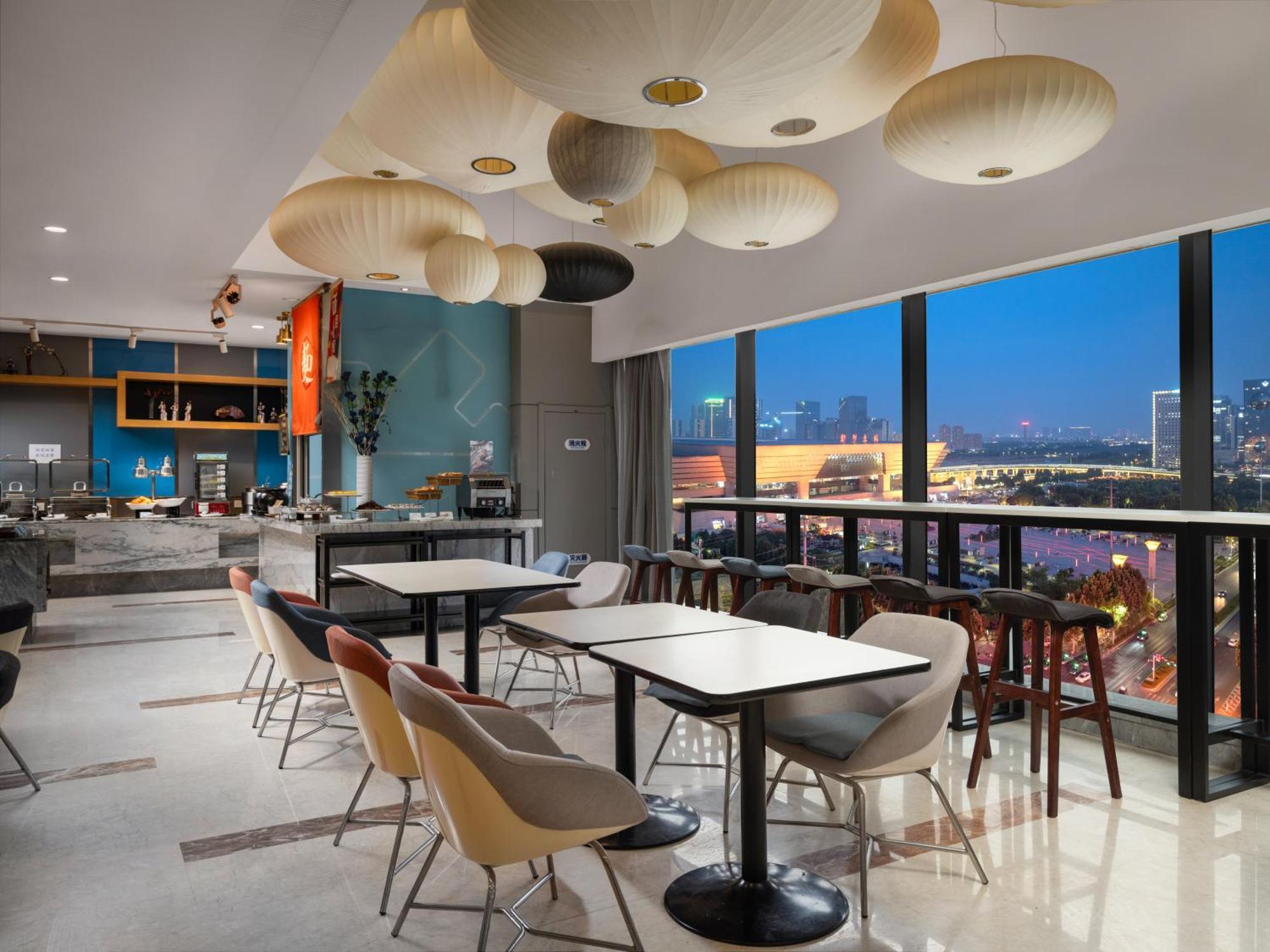 Holiday Inn Express Zhengzhou Zhengdong By Ihg Экстерьер фото