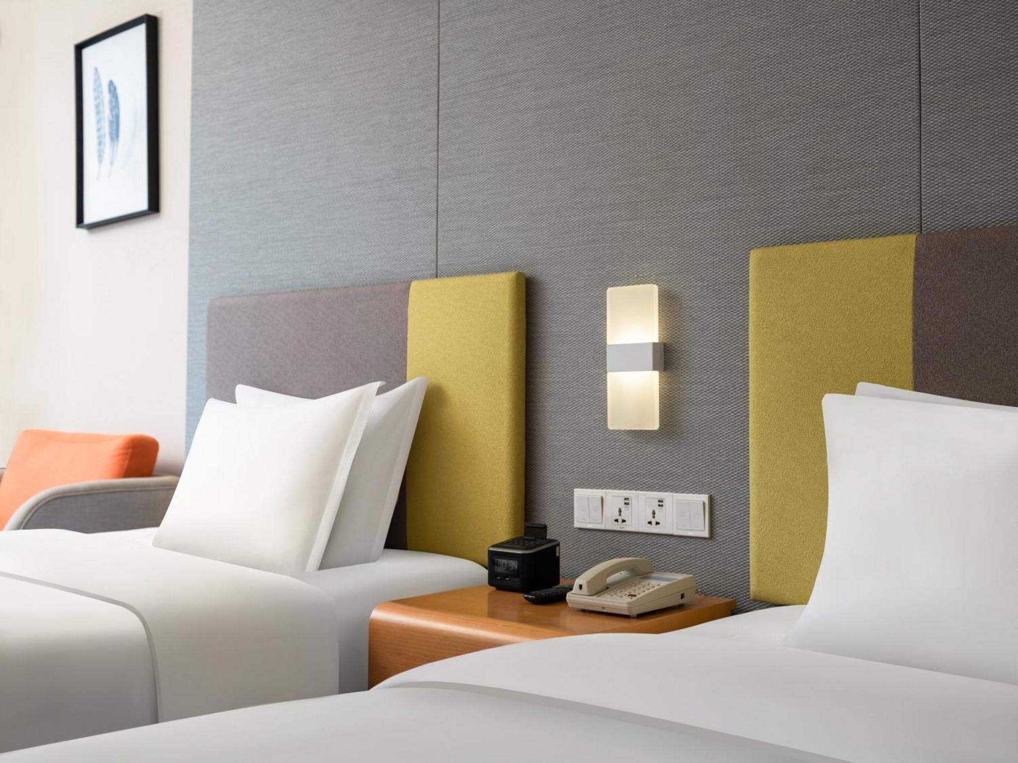 Holiday Inn Express Zhengzhou Zhengdong By Ihg Экстерьер фото